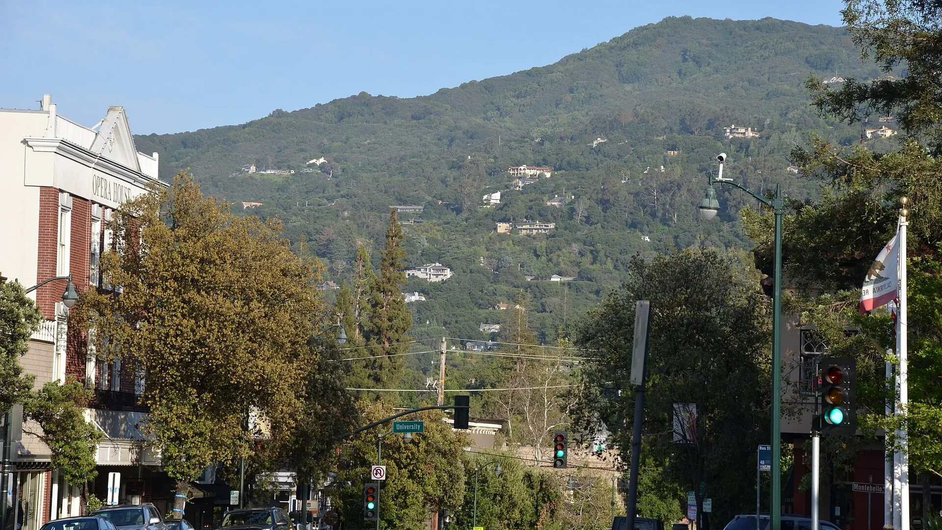 Main Street in downtown Los Gatos with the Opera House and the hills behind town