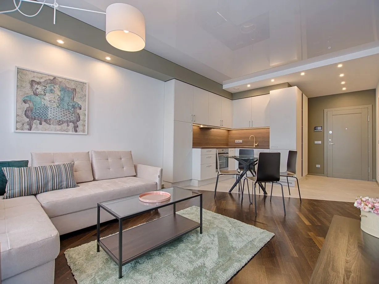 Recessed can lights installed across a living room ceiling in San Jose